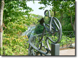 Iron rail work at the Mill Creek Falls  emphasizes nature in the City.